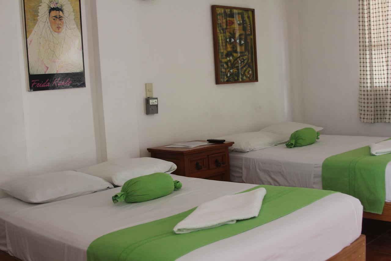 Hotel Mayflower ปูแอร์โตเอสกอนดิโด ภายนอก รูปภาพ